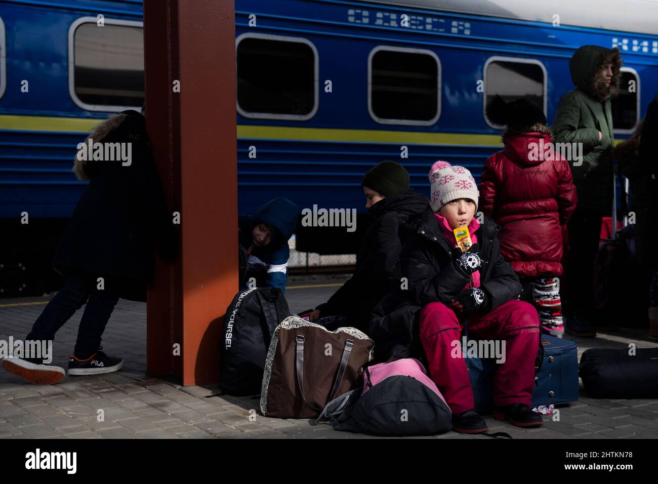 Przemysl, Poland. 01st Mar, 2022. War refugees from Ukraine, who cross into Poland, wait for train at the Przemysl station, Tuesday, March 1, 2022. Russia's military assault on Ukraine is now in its sixth day. Credit: Ondrej Deml/CTK Photo/Alamy Live News Stock Photo