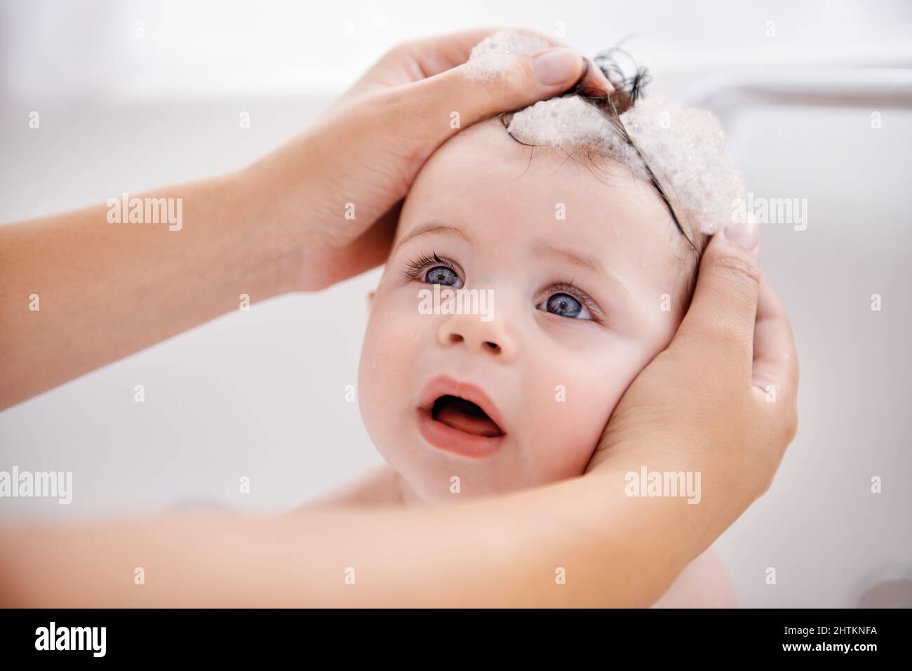 Time for the shampoo, my darling. Cropped shot of a mother washing her