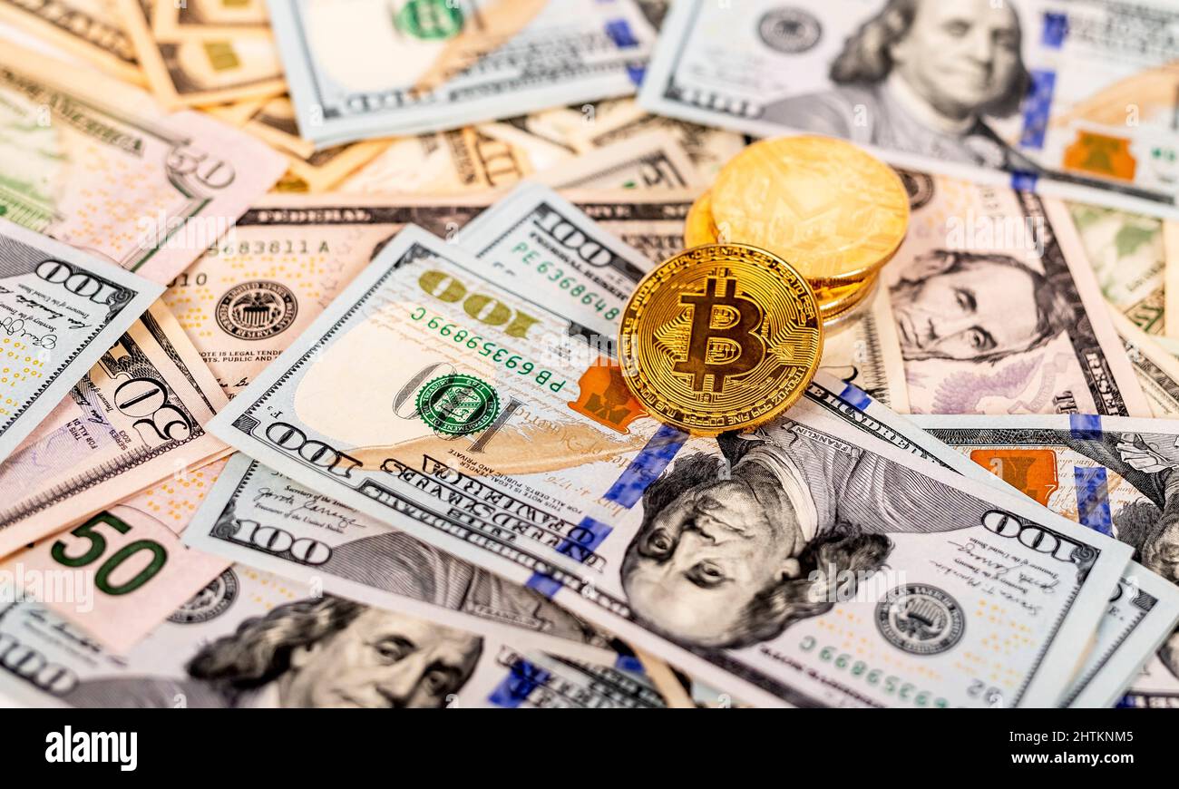 Bitcoin, litecoin on dollar bills background. Traditional currency and  cryptocurrency as digital payment method. Wealth and income concept. High  quality photo Stock Photo - Alamy