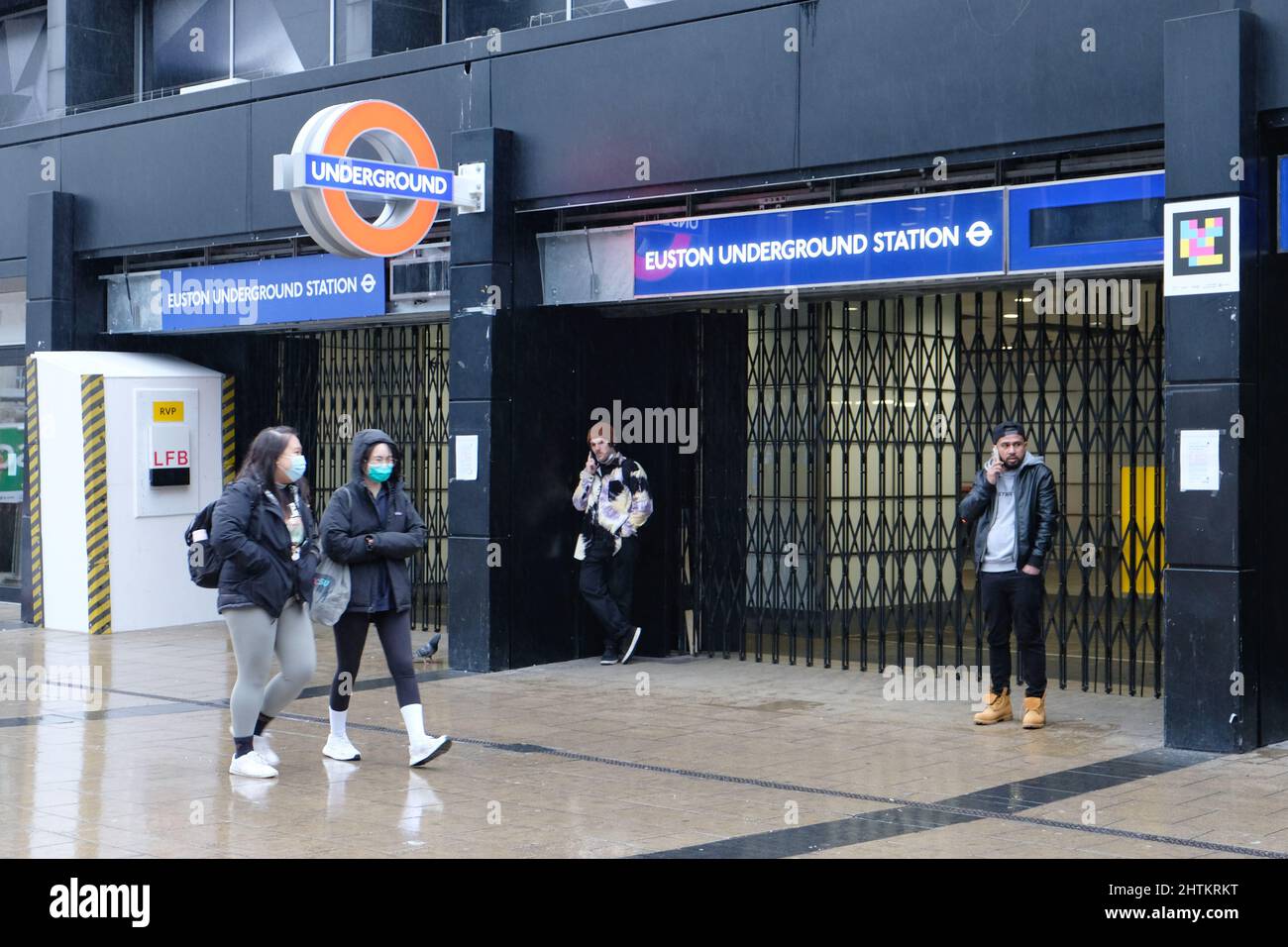 London, UK, 1st Mar, 2022. Members of the public walk past a shuttered Euston Underground Station as visitors and commuters found alternative ways to complete their journey this afternoon, on foot, via bus, taxi or cycling, amid a Tube strike affecting all services. The strike called by the RMT Union over threats of 600 job losses and pension cuts saw 10,000 staff walk out. Credit: Eleventh Hour Photography/Alamy Live News Stock Photo