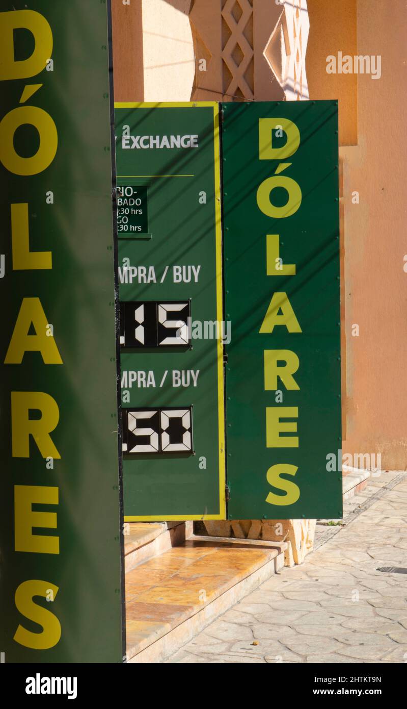 Spanish language dollar exchange rate signs Playa del Carmen, Mexico Stock Photo