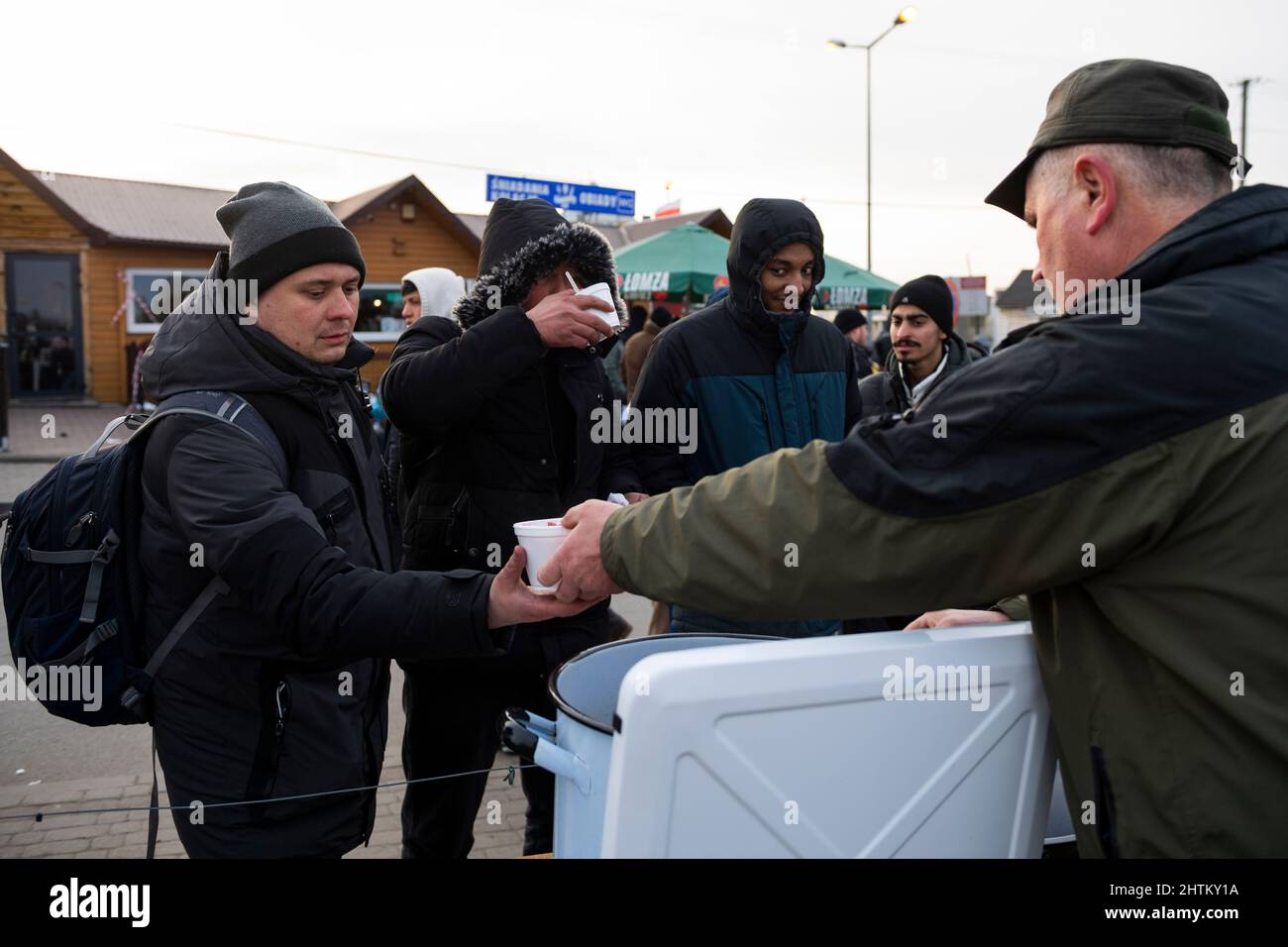 Medyka, Poland. 01st Mar, 2022. War refugees from Ukraine cross into Poland at the Medyka border