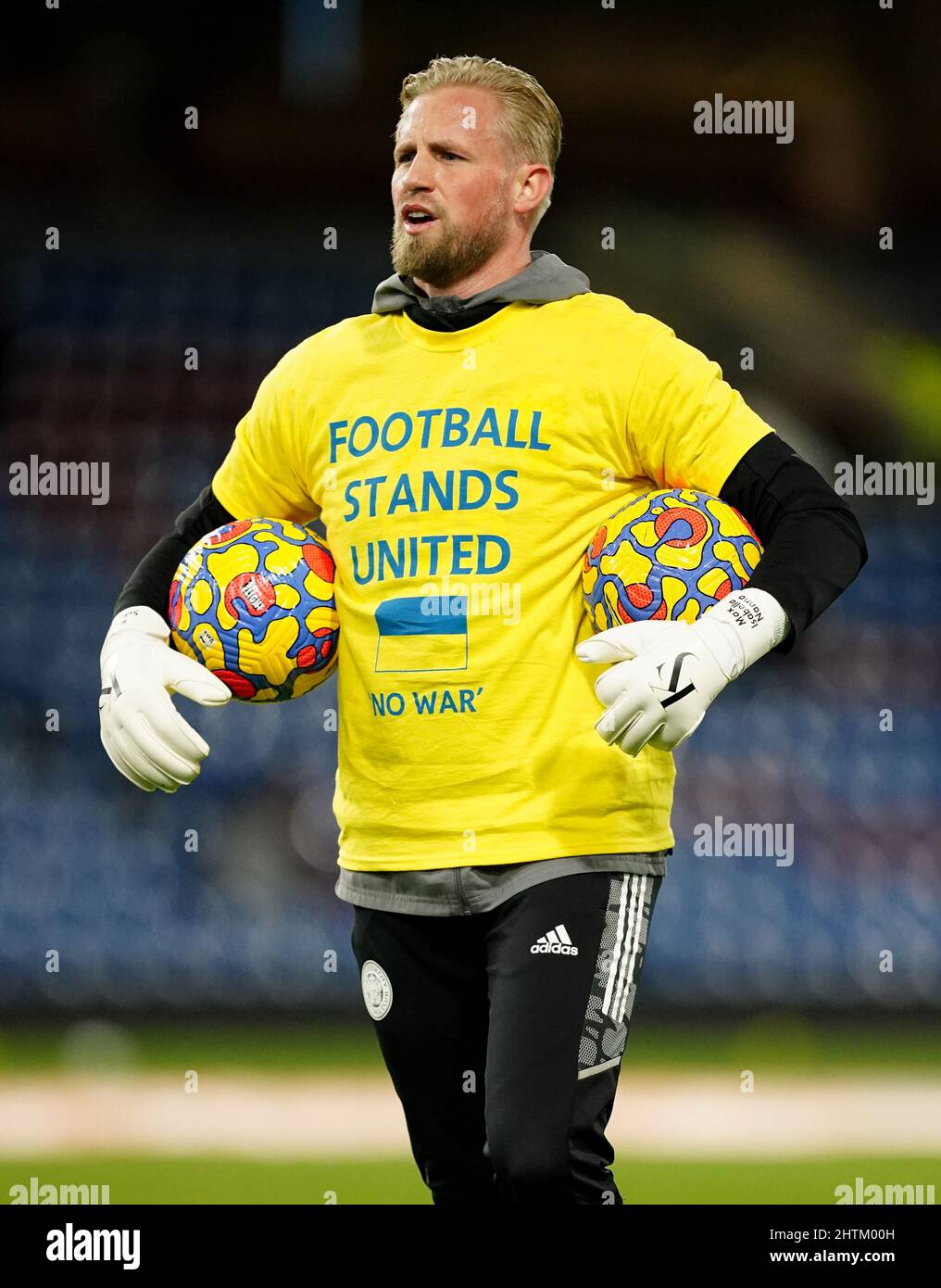 Leicester City goalkeeper Kasper Schmeichel wears a t-shirt in support of  the Ukraine during warm up prior to the Premier League match at Turf Moor,  Burnley. Picture date: Tuesday March 1, 2022