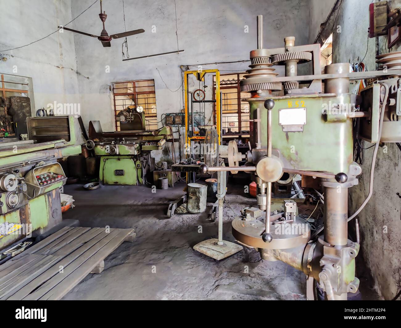 Industrial factory interior with grinding surface machine Small