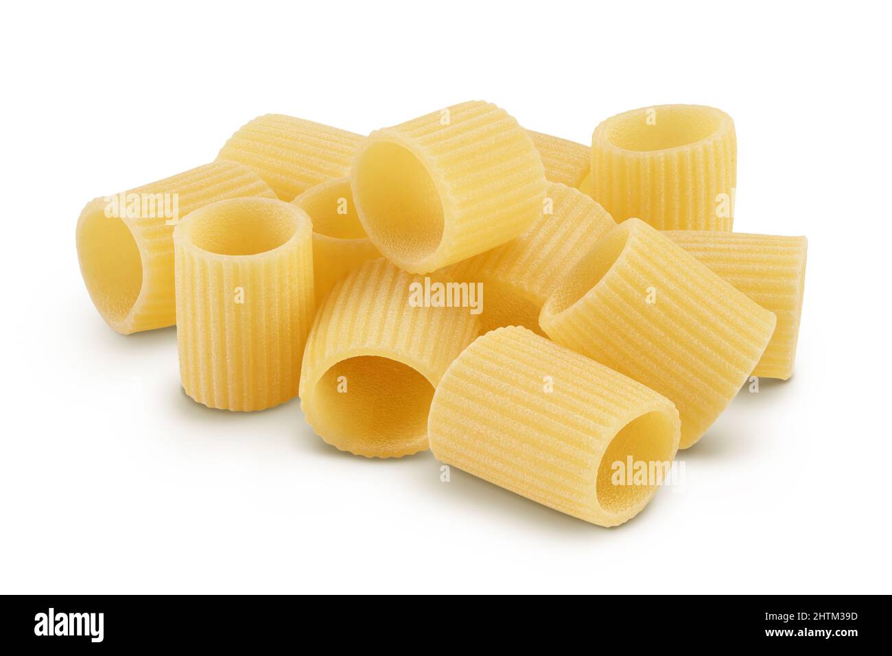 raw italian pasta isolated on white background with clipping path . Mezze Maniche Rigate Bronze die Stock Photo