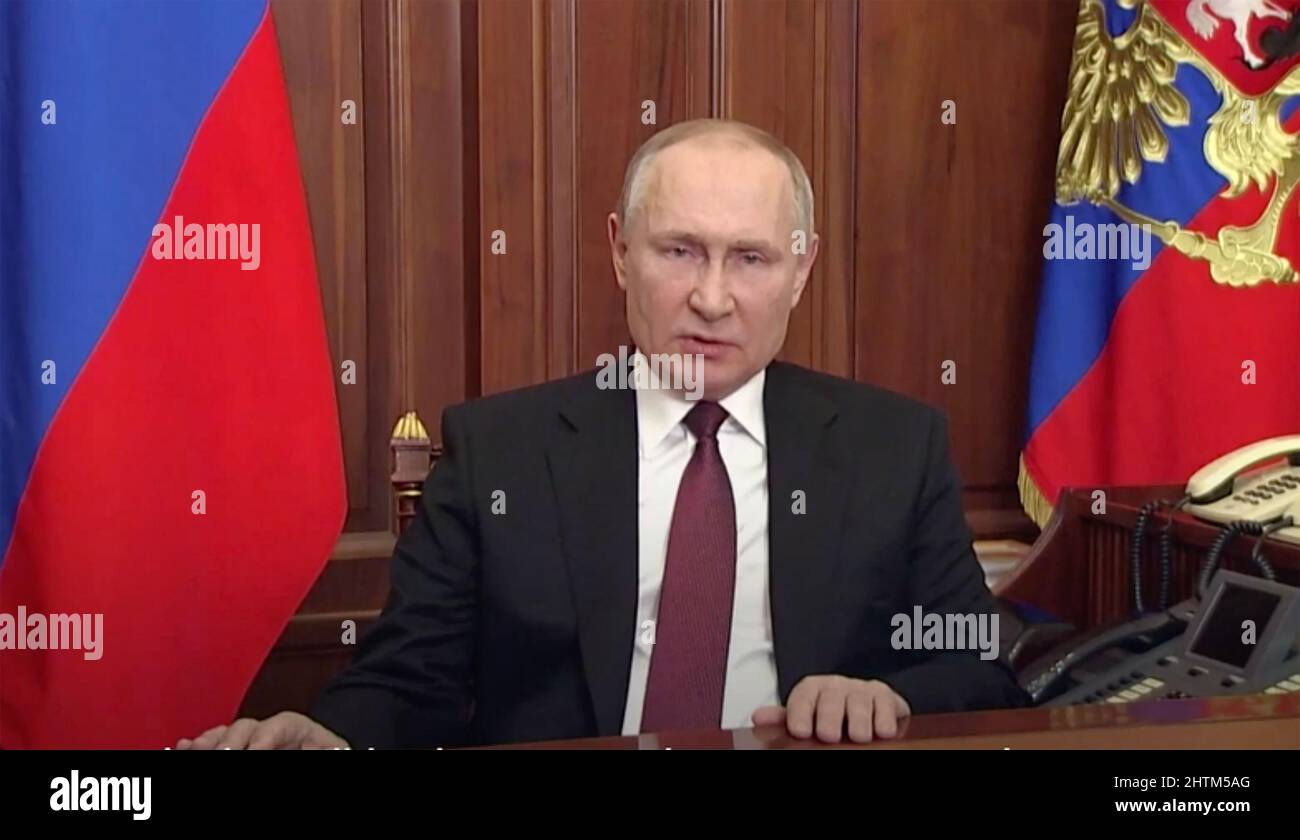 VLADIMIR  PUTIN, Russian President, in the TV broadcast  from the Kremlin on 24 February 2022, in which he said he would 'denazify' Ukraine. Stock Photo