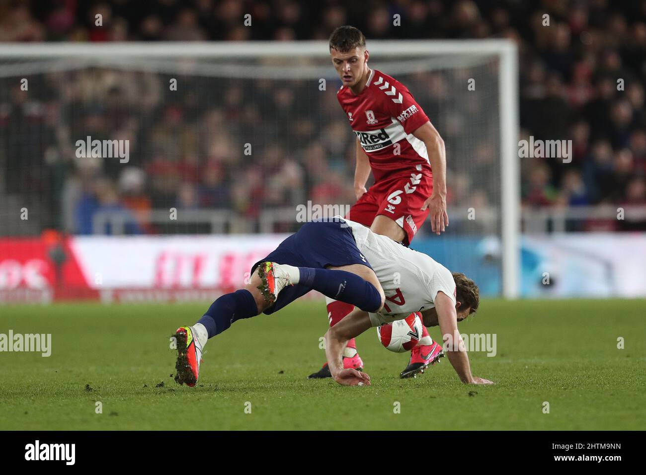 MIDDLESBROUGH, UK. MAR 1ST Tottenham Hotspur's Harry Kane falls over in front of Middlesbrough's Dael Fry during the FA Cup Fifth Round match between Middlesbrough and Tottenham Hotspur at the Riverside Stadium, Middlesbrough on Tuesday 1st March 2022. (Credit: Mark Fletcher | MI News) Credit: MI News & Sport /Alamy Live News Stock Photo