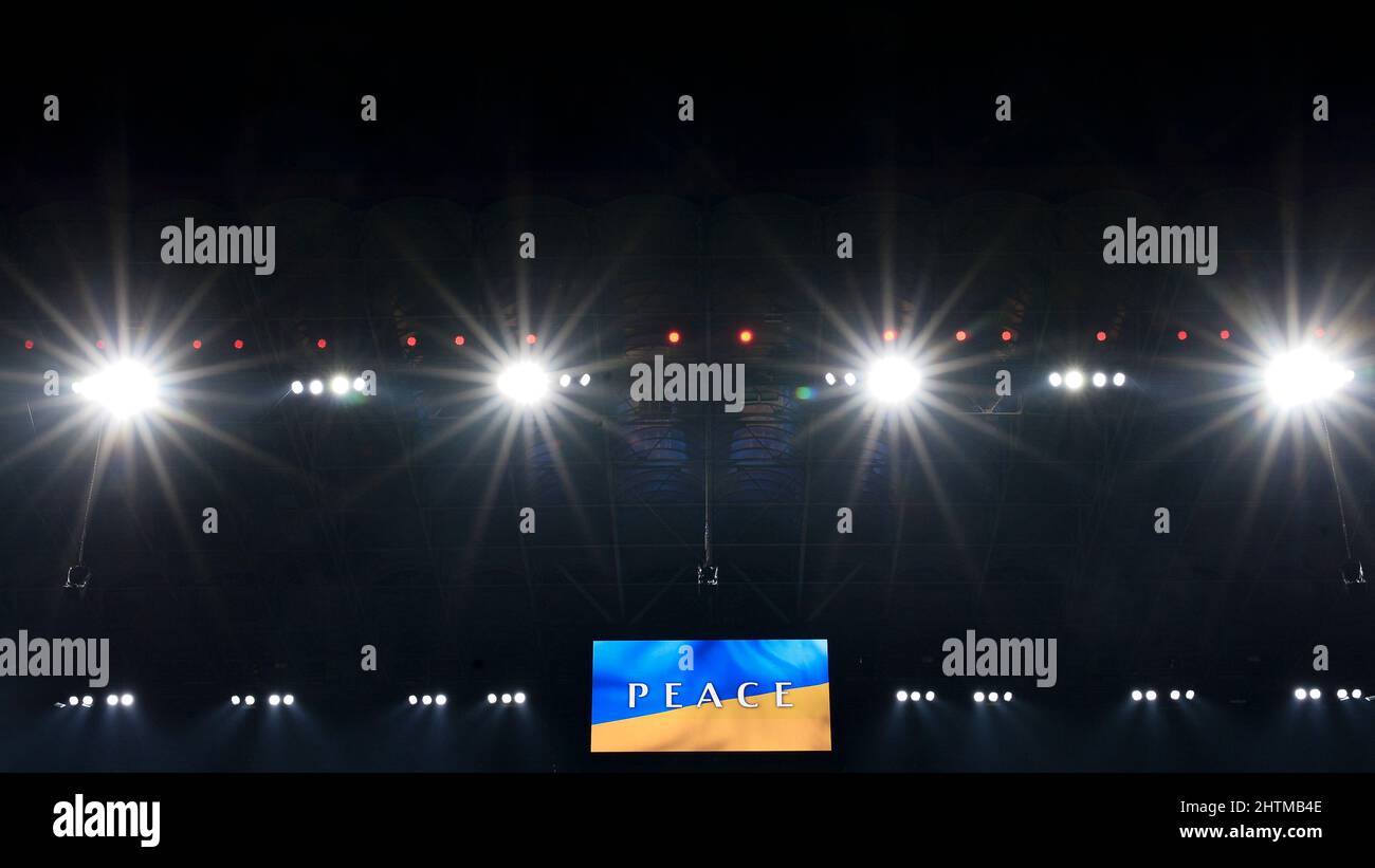 Milan, Italy. 01 March 2022. A scoreboard displays the flag of Ukraine ...