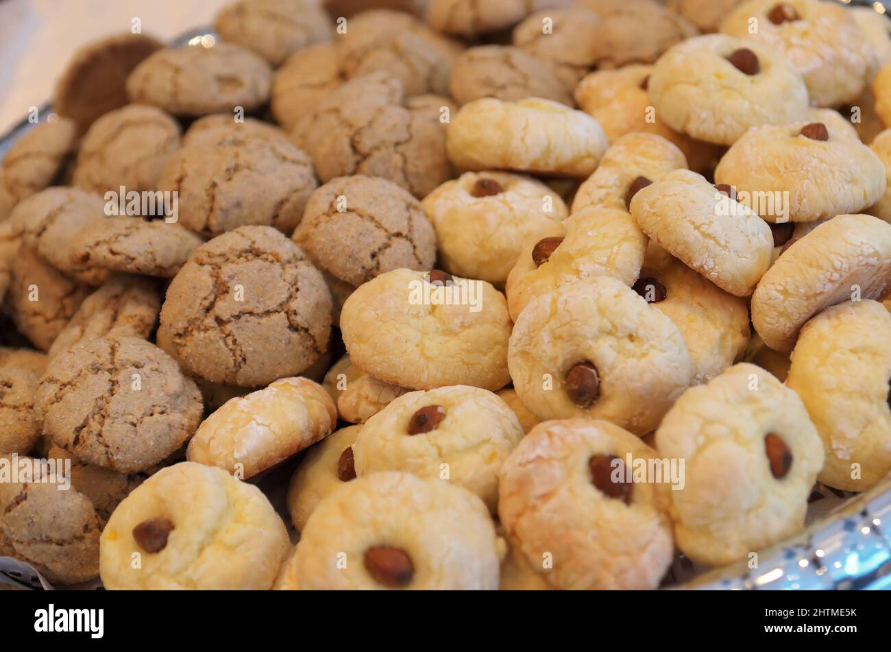 A wedding platter of delicious Italian almond cookies or ricciarelli typical of Sardinia region Stock Photo
