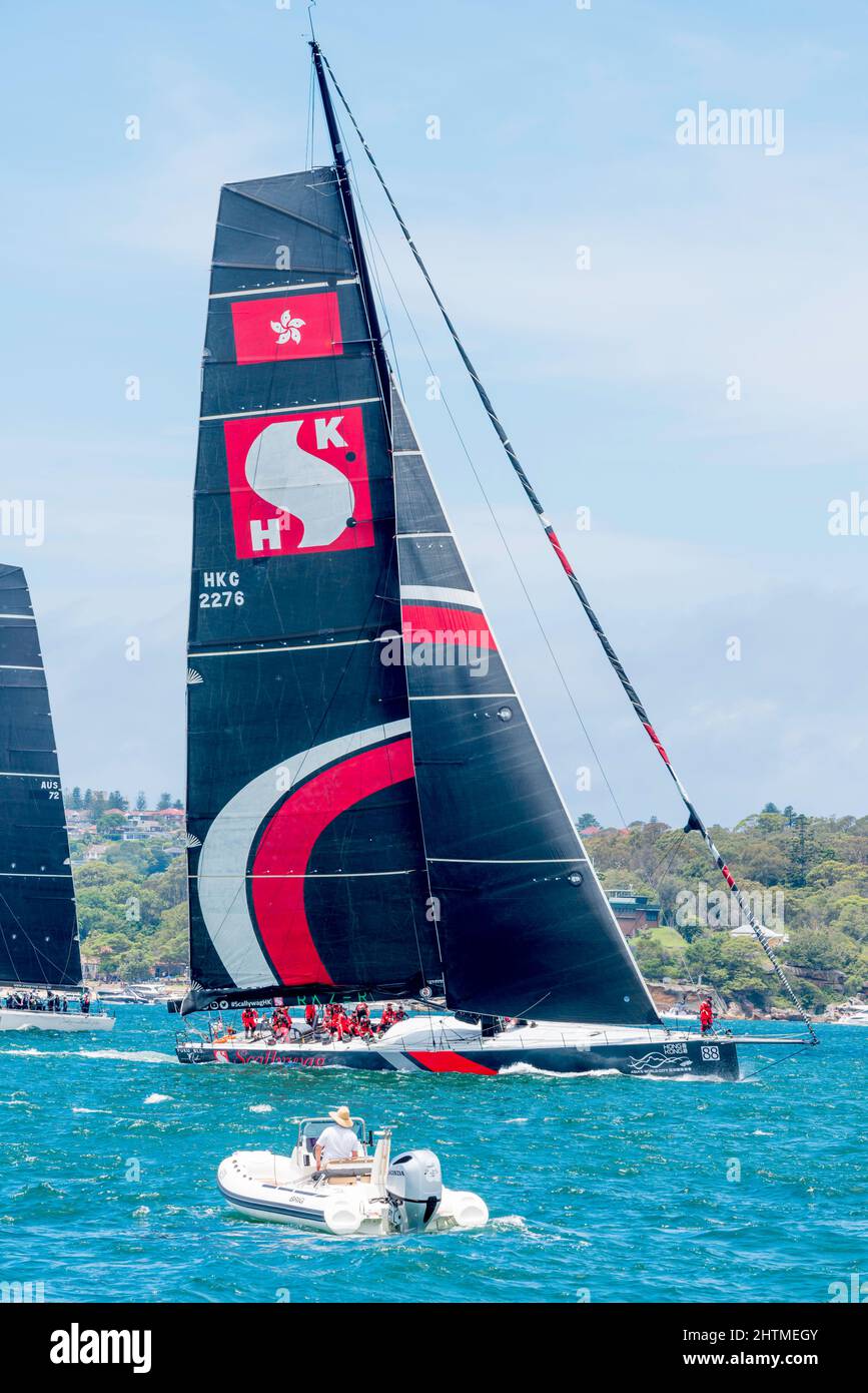 The Dovell100 maxi yacht, SHK Scallywag maneuvering before the start of the Sydney to Hobart Yacht Race on December 26, 2021 in Sydney Harbour Stock Photo