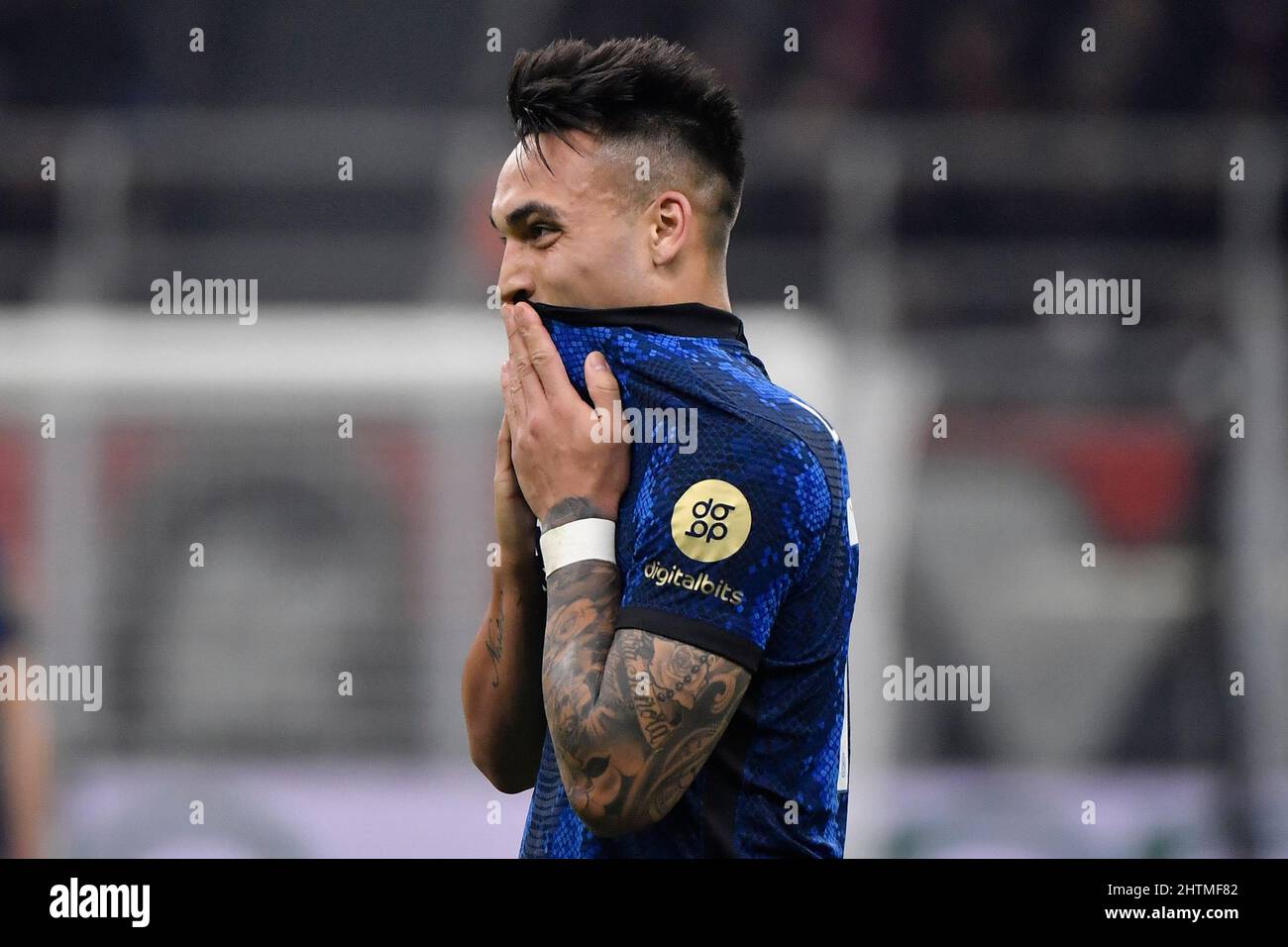 Milano, Italy. 01st Mar, 2022. Marcelo Brozovic of FC Internazionale and  Rafael Leao of AC Milan during the Italy cup semifinal football match  between AC Milan and FC Internazionale at San Siro