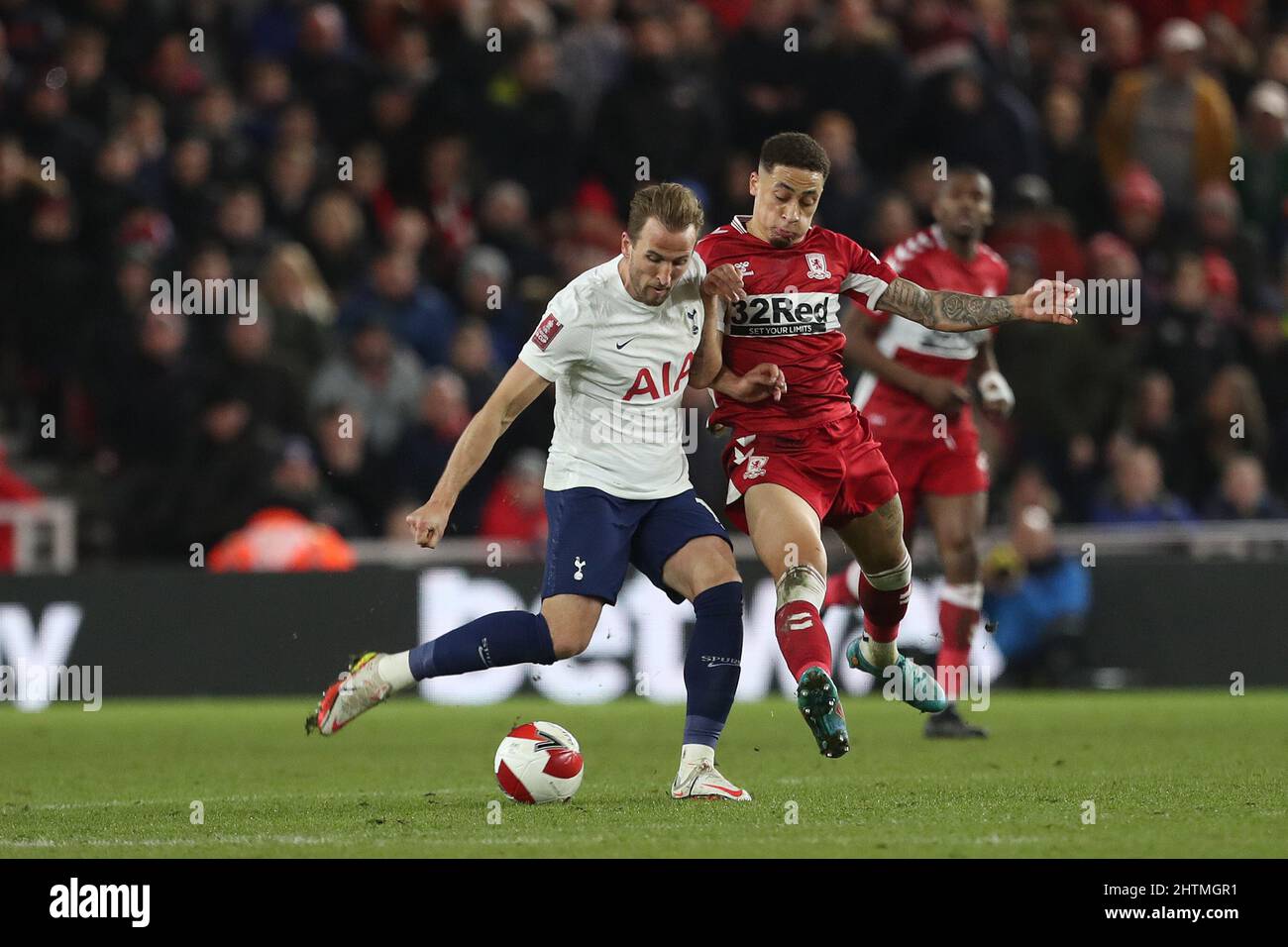 MIDDLESBROUGH, UK. MAR 1ST Middlesbrough's Marcus Tavernier battles with Tottenham Hotspur's Harry Kane during the FA Cup Fifth Round match between Middlesbrough and Tottenham Hotspur at the Riverside Stadium, Middlesbrough on Tuesday 1st March 2022. (Credit: Mark Fletcher | MI News) Credit: MI News & Sport /Alamy Live News Stock Photo