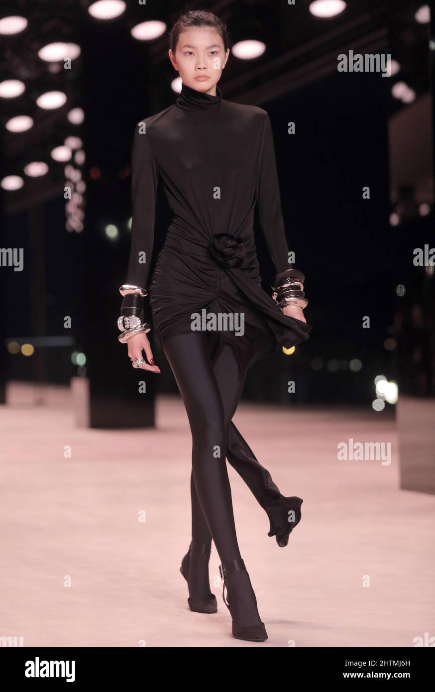Paris, France. 01st Mar, 2022. A model takes to the catwalk during Yves Saint Laurent's Fall-Winter 2022-2023 presentation during Paris Fashion Week on Tuesday, March 1, 2022. Photo by Eco Clement/UPI Credit: UPI/Alamy Live News Stock Photo