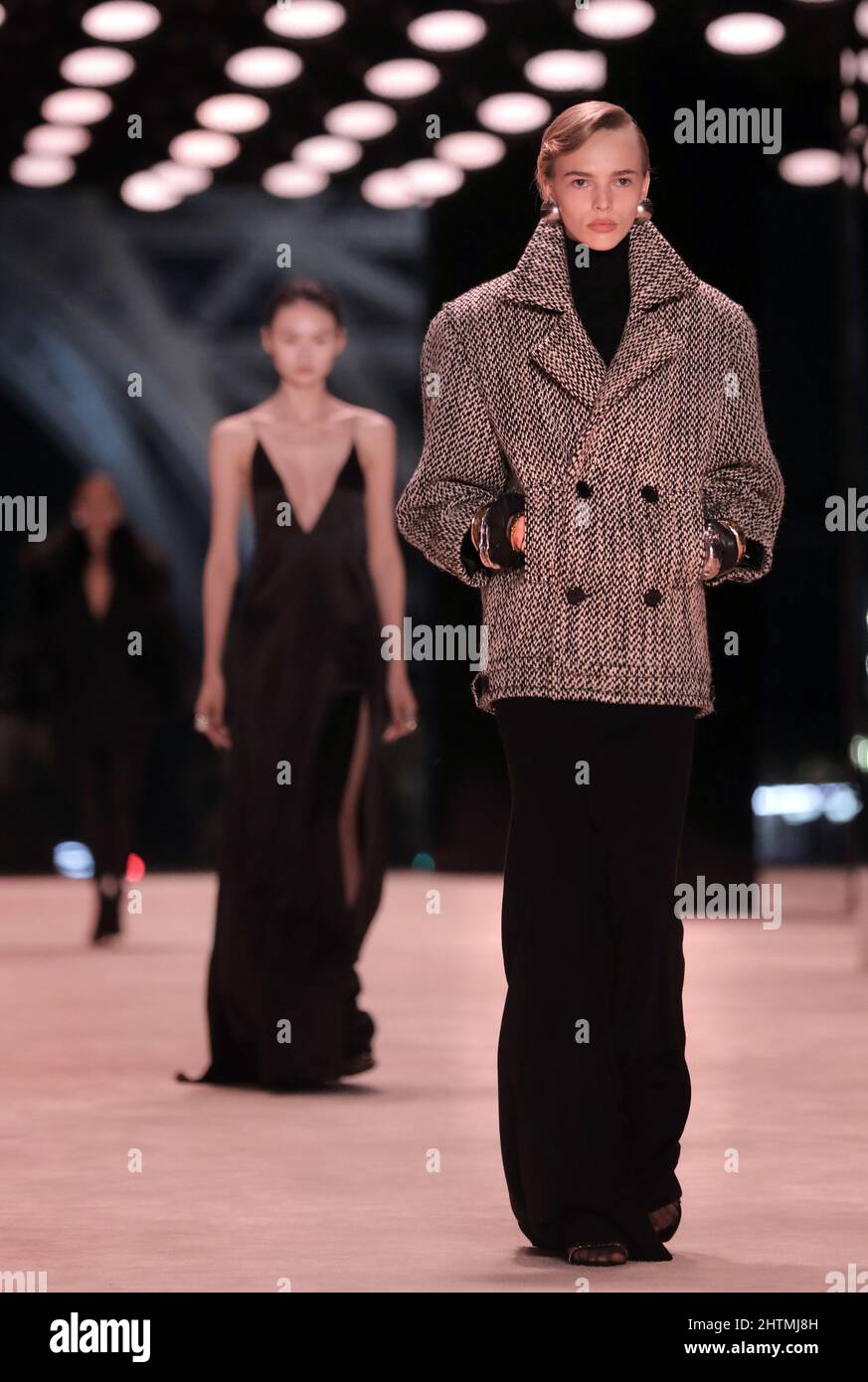 Paris, France. 01st Mar, 2022. A model takes to the catwalk during Yves  Saint Laurent's Fall-Winter 2022-2023 presentation during Paris Fashion  Week on Tuesday, March 1, 2022. Photo by Eco Clement/UPI Credit: