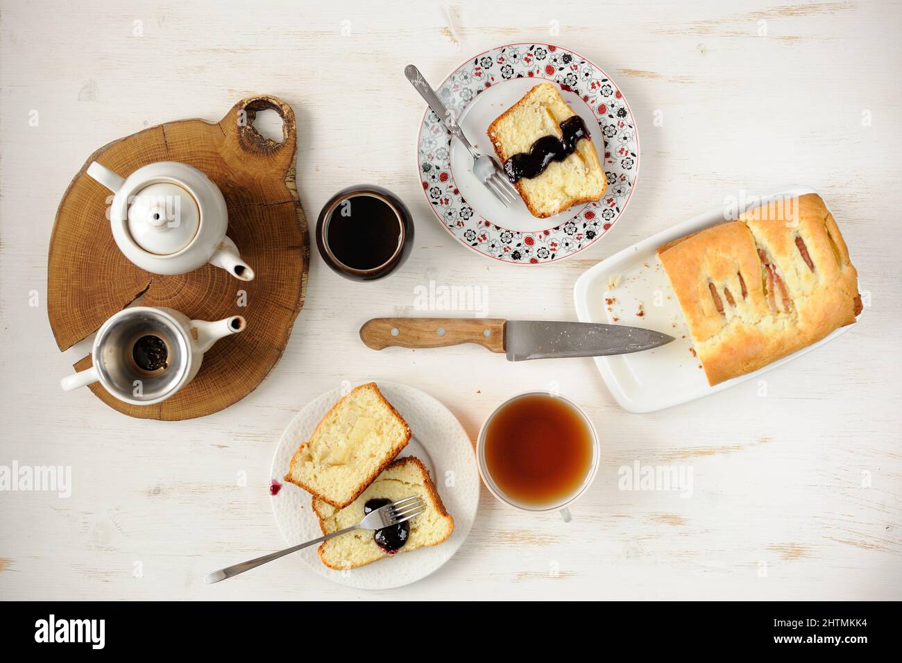 Teaware with homemade cake on white table topview overhead view Stock Photo