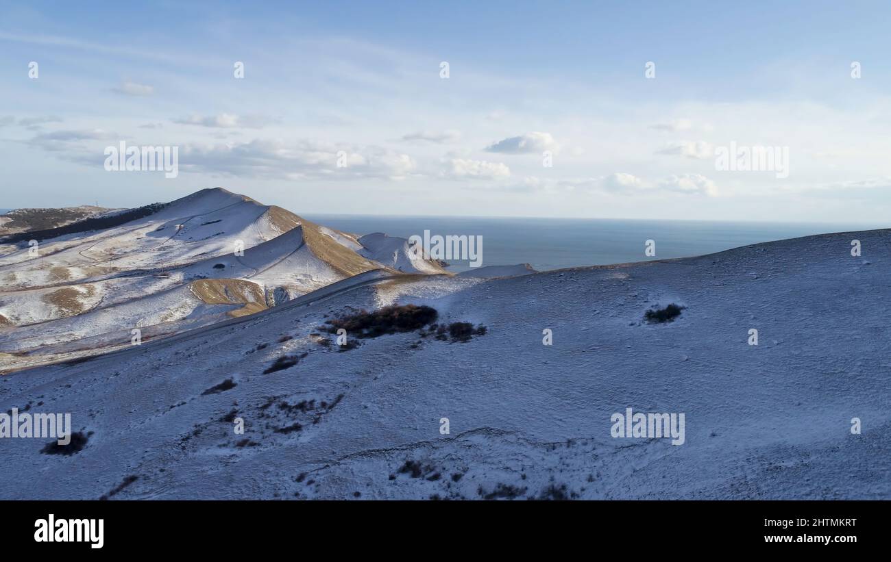 Panorama of mountains and sea. Shot. Beautiful natural aerial landscape in the Norway. Top view on beautiful landscape with mountains and sea in winte Stock Photo