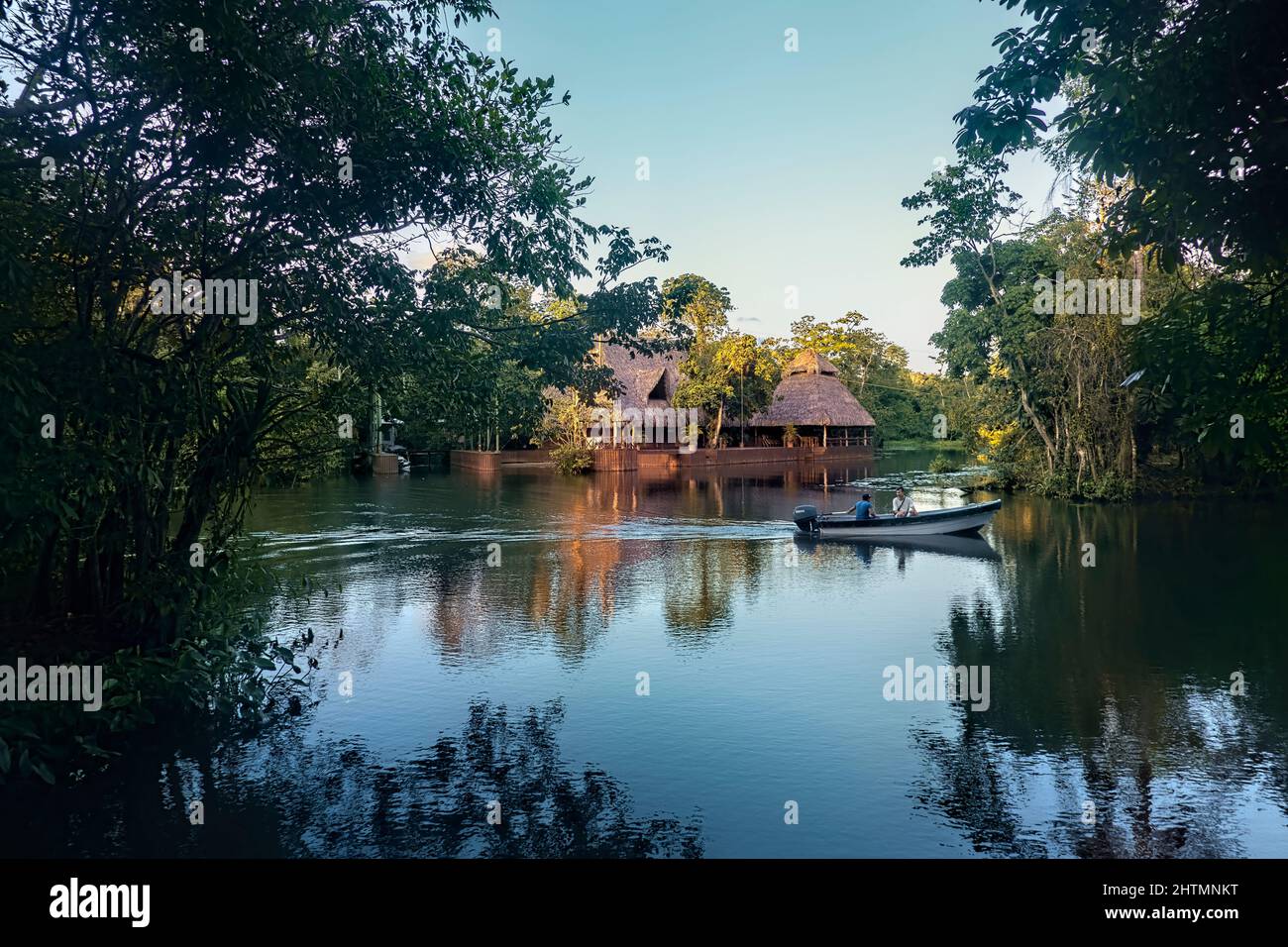 Thatch roof home on the Rio Dulce, Guatemala Stock Photo Alamy