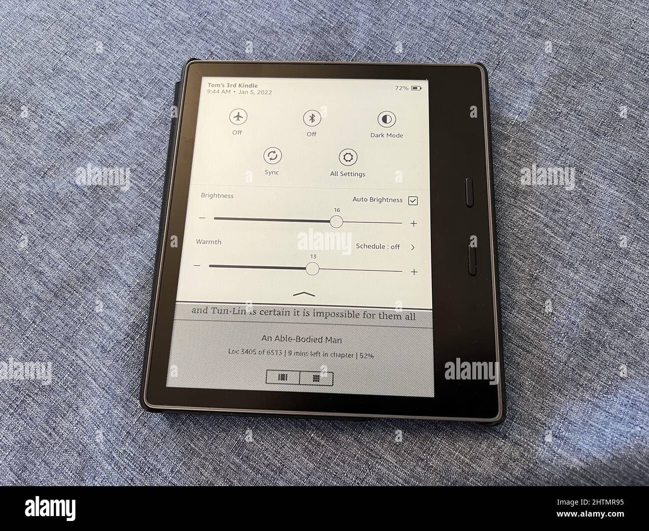 Amazon Kindle Oasis eBook reader on a light gray surface, Lafayette, California, January 5, 2022. Photo courtesy Tech Trends. Stock Photo