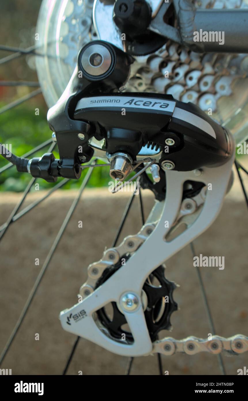 Shimano Acera bicycle rear derailleur. Bicycle components Stock Photo -  Alamy