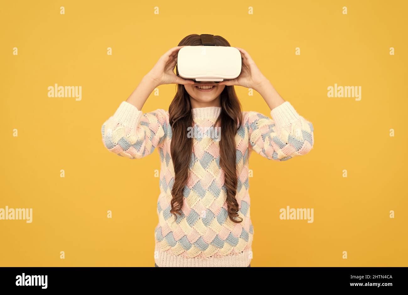 teen girl wear vr glasses using future technology for education in virtual reality, vr training Stock Photo
