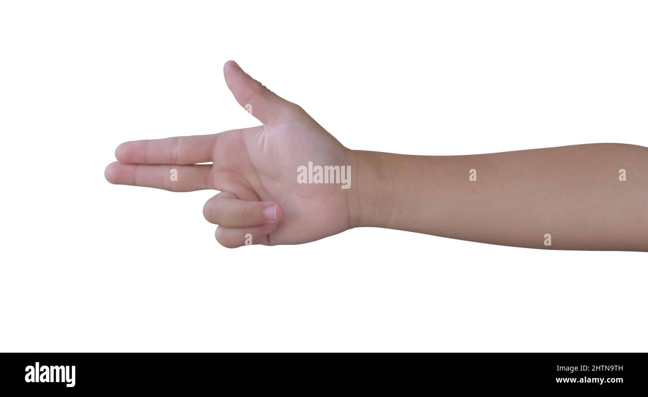 Child hand making shooting gun, gesture on isolated white background. Hand pointing with two finger. Stock Photo