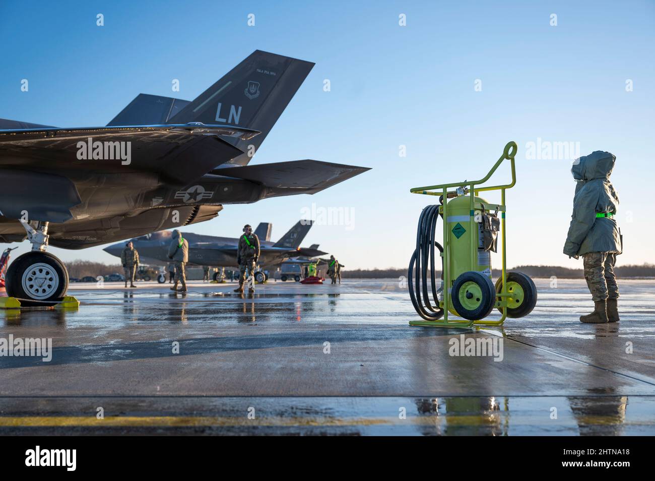 U.S. Air Force Airmen assigned to the 748th Aircraft Maintenance Squadron prepare an F-35 Lightning II aircraft assigned to the 48th Fighter Wing for take-off at Ämari Air Base, Estonia, March 1, 2022. Members of the 48th FW forward deployed to Ämari AB to support NATO’s collective defense and enhanced Air Policing mission. (U.S. Air Force photo by Staff Sgt. Megan M. Beatty) Stock Photo
