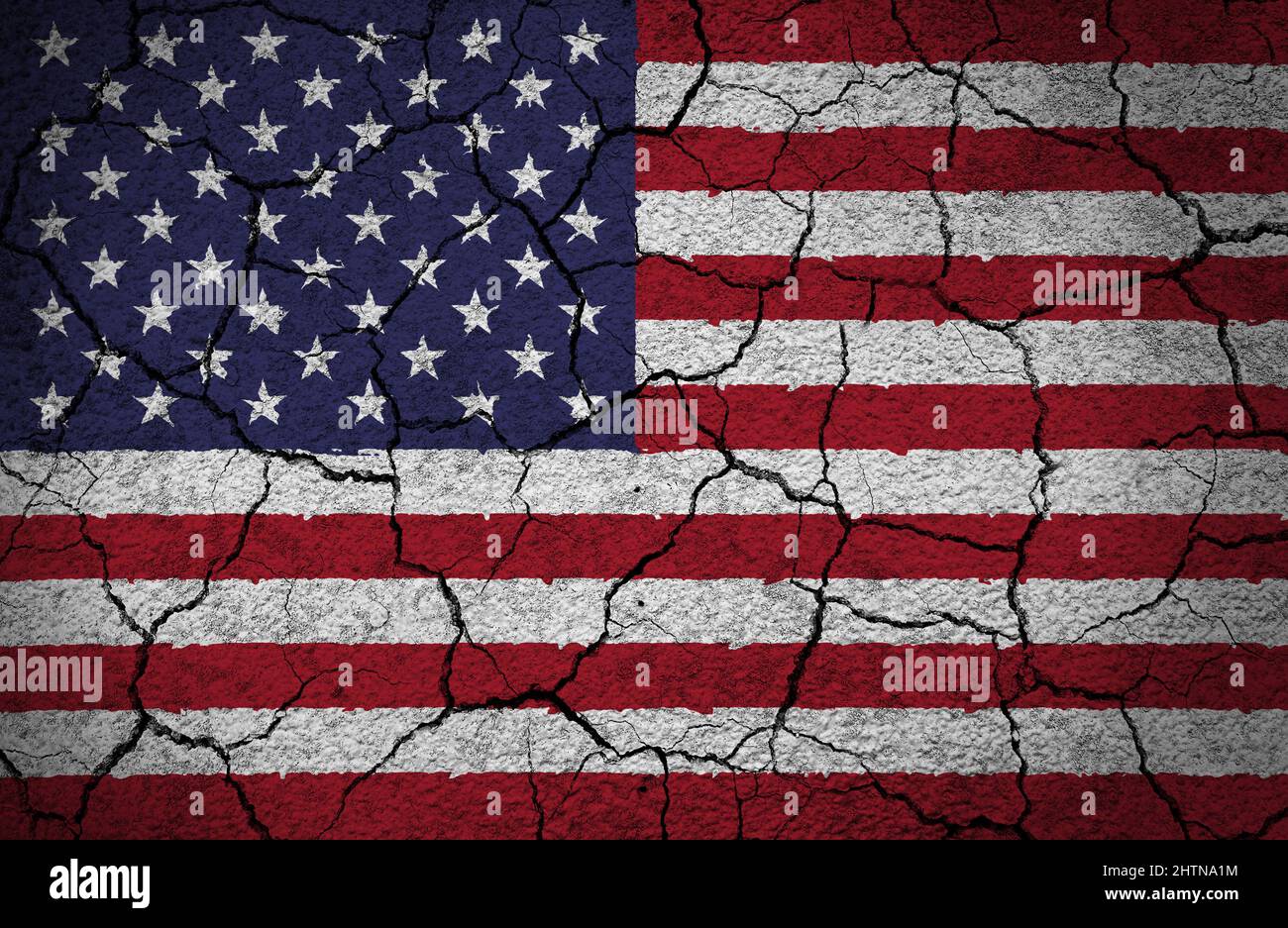 US American flag painted on a cracked and grunge concrete wall. Concept of a country in crisis, danger, torn, broken. Stock Photo