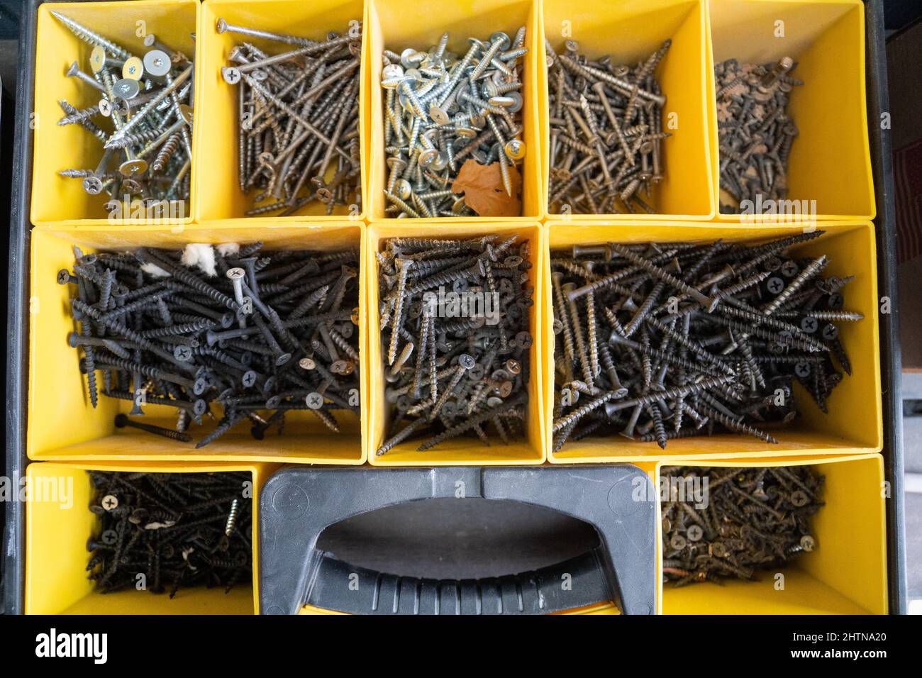 Nails and wood screws in hardware storage bins Stock Photo Alamy