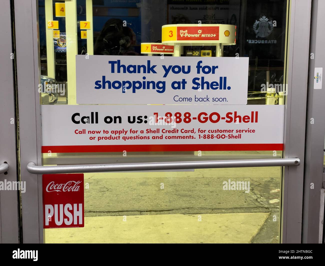 California, USA. 28th Feb, 2022. Shell gas station window signs (Credit