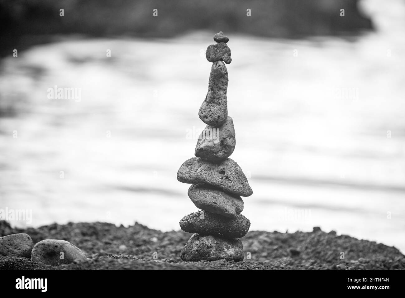 Pyramid of sea pebbles on beach. Life balance and harmony concept