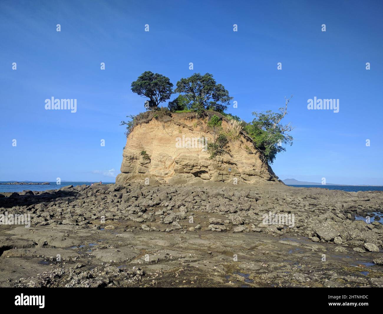 The view of Torbay tor at Waiake Beach, Auckland, New Zealand Stock