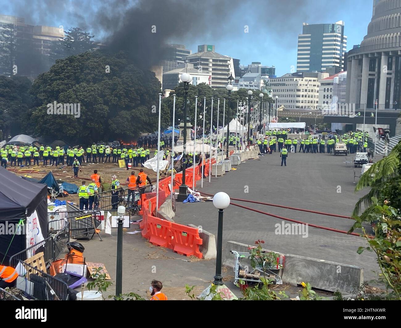 Anti-vaccine mandate protesters clash with police in front of the parliament in Wellington, New Zealand March 2, 2022. REUTERS/ Lucy Craymer Stock Photo