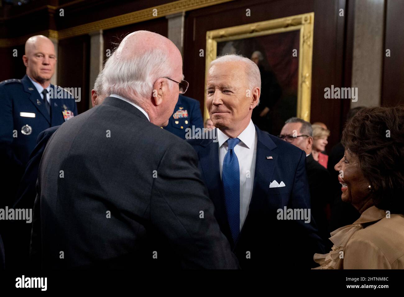 US President Joe Biden (C) speaks to Senator Patrick Leahy (D-VT) after delivering the State of the Union address to a joint session of Congress at the US Capitol in Washington, DC, USA on March 1, 2022. Photo by Saul Loeb/Pool/ABACAPRESS.COM Stock Photo