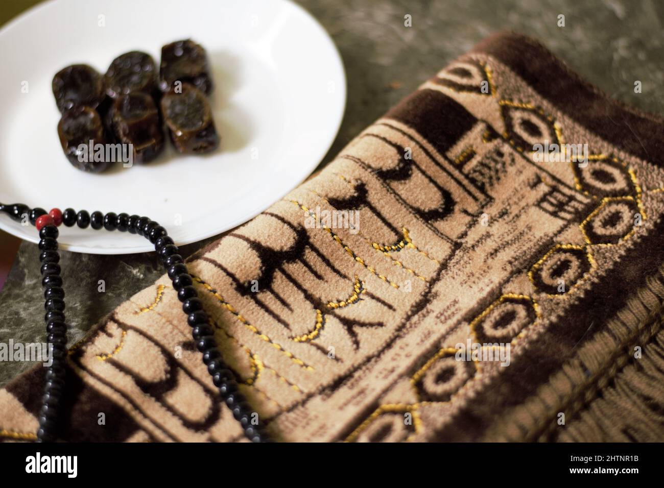 Dates, prayer mate and bead are synonym with the holy month of Ramadhan