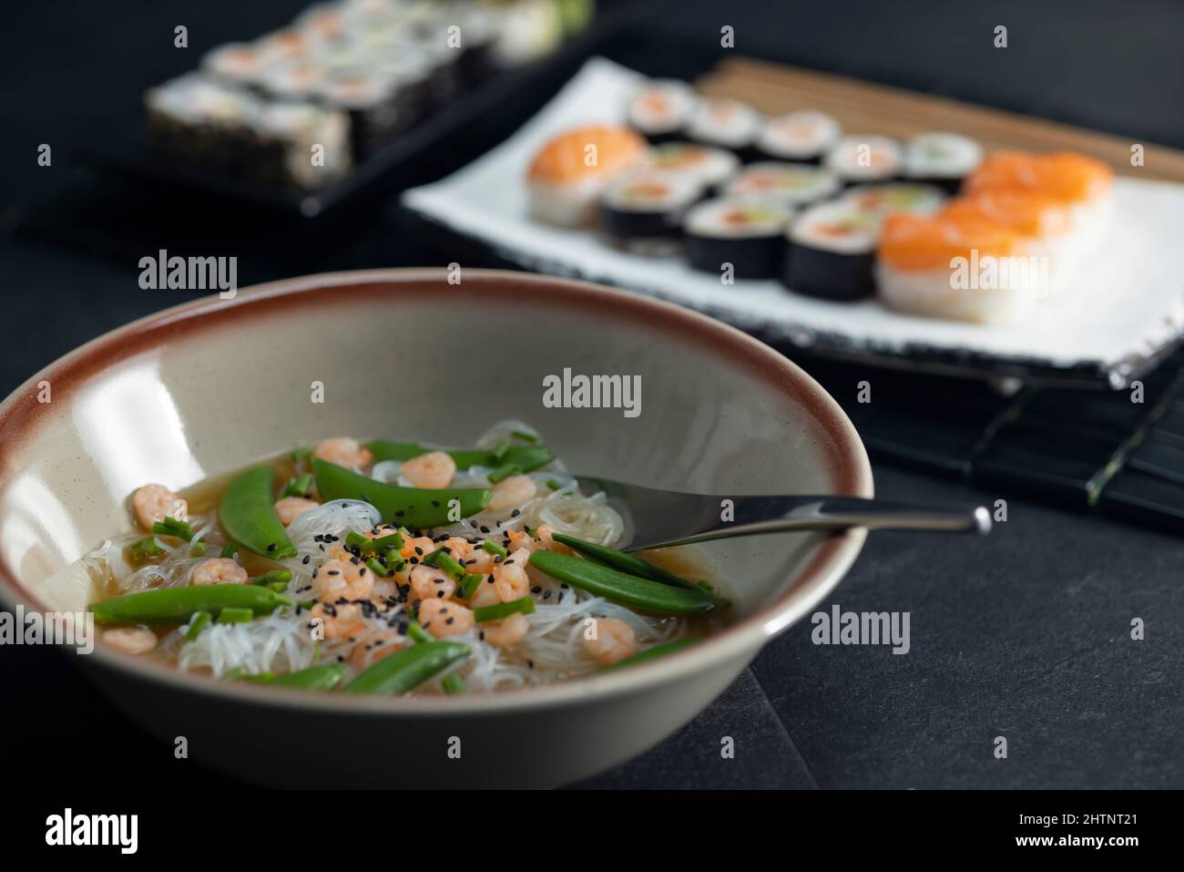 Various dishes of Asian cuisine with typical sushi Stock Photo Alamy