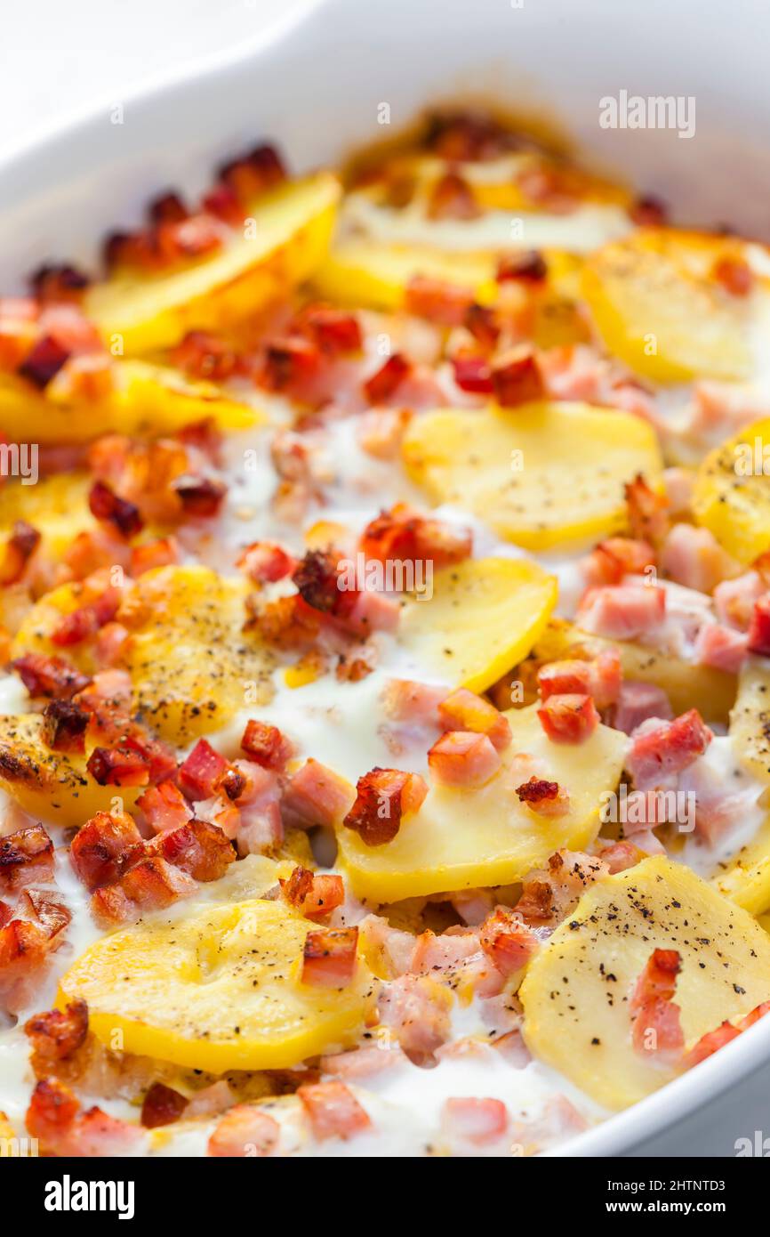 baked potatoes with bacon and eggs Stock Photo