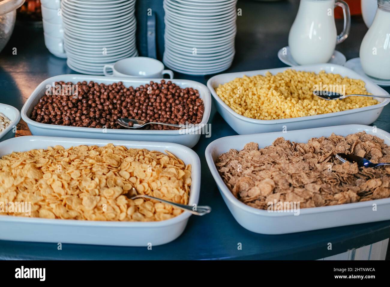 Cereal in big bowls for self service dry quick breakfast food in hotel restaurant selection