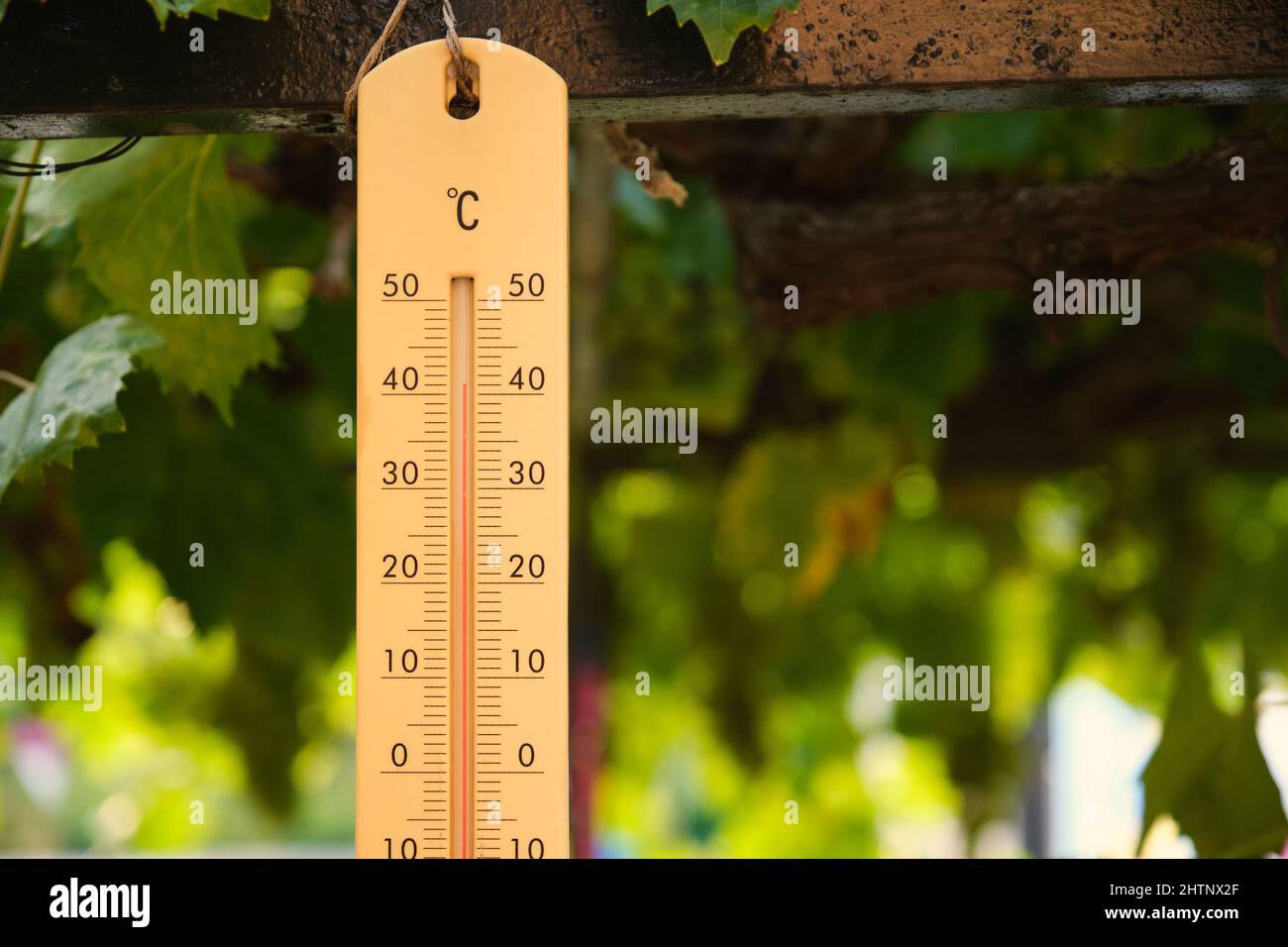 Outdoor thermometer reaches 40 forty degrees centigrade. Stock Photo