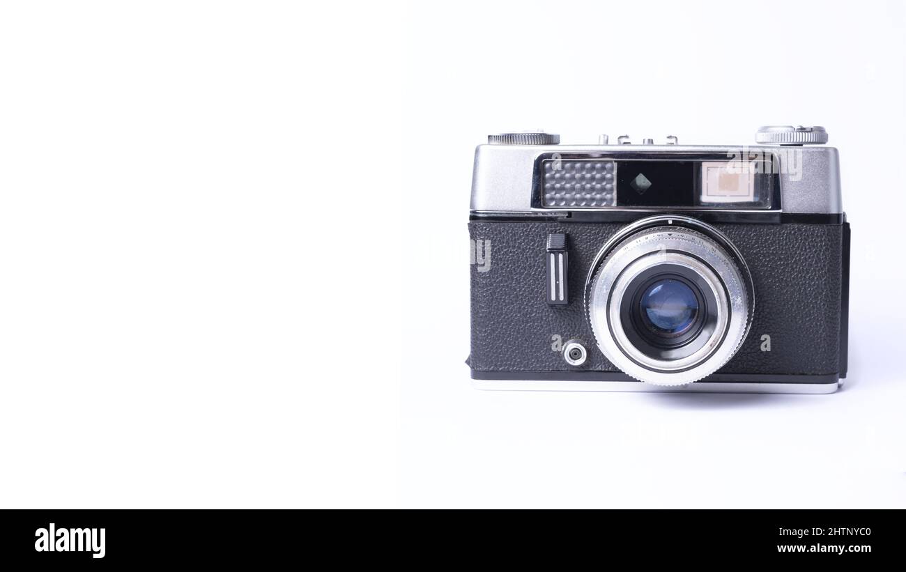 Old vintage camera isolated on a white background Stock Photo - Alamy