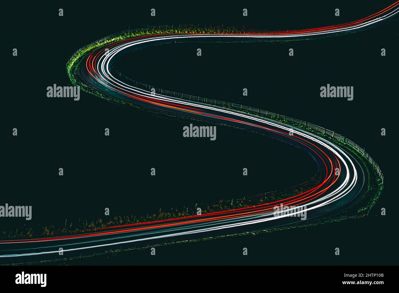 Light trails of cars on a road at night Stock Photo - Alamy
