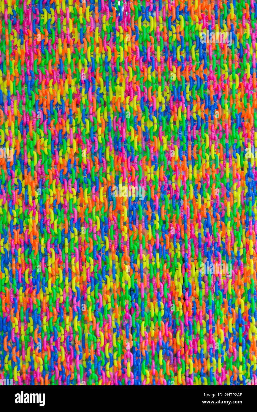 Colorful plastic chain background Stock Photo - Alamy