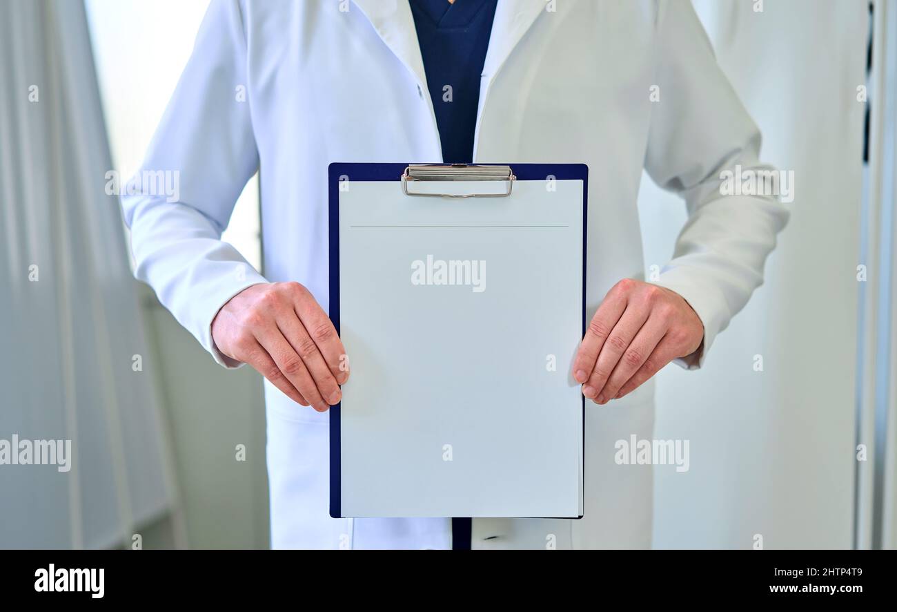 Young doctor man holds tablet hi-res stock photography and images - Alamy