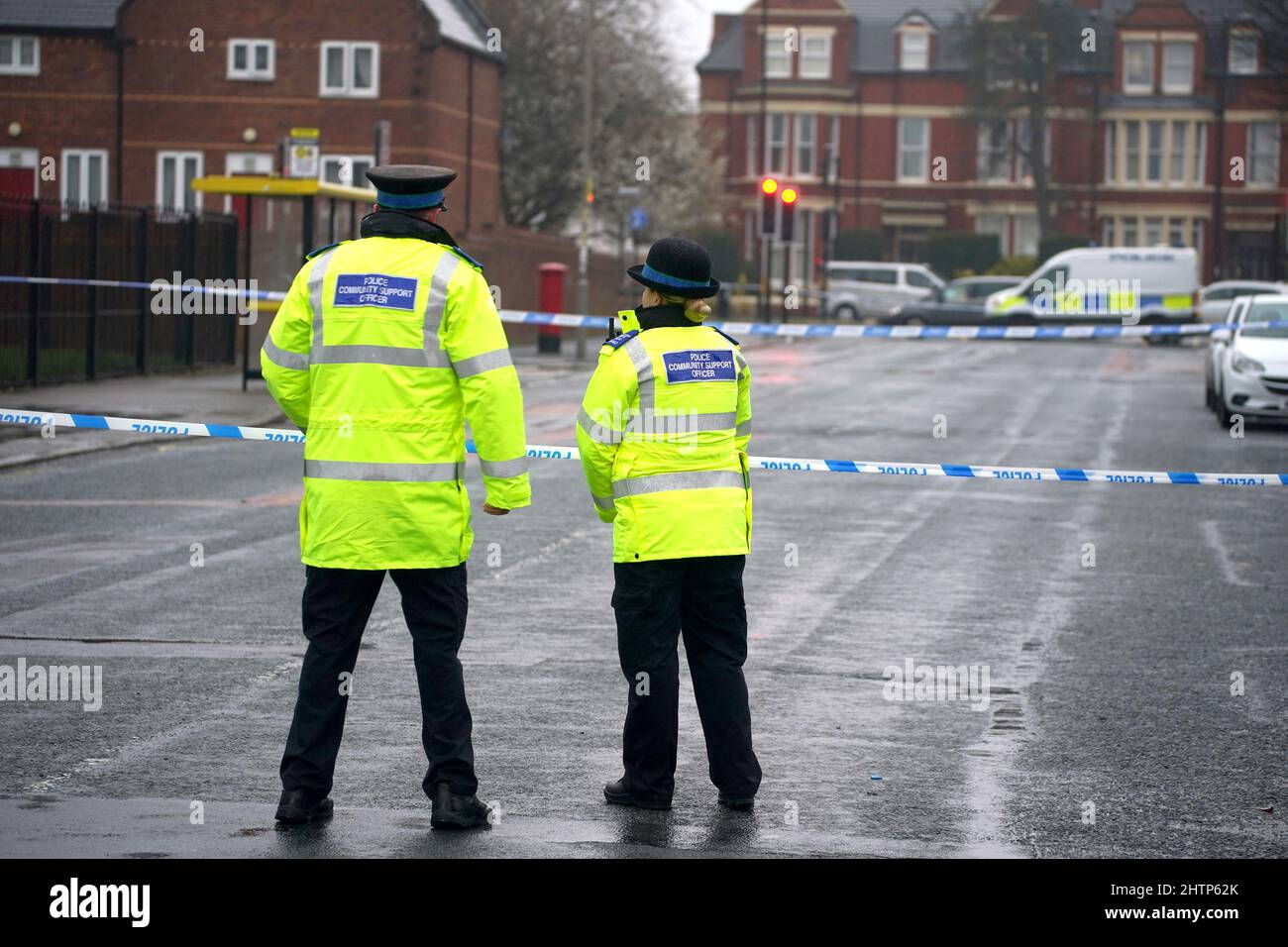 Police community support officers at the scene in Upper Warwick Street in Toxteth, Liverpool, after a teenage girl was seriously injured in a shooting incident late Tuesday afternoon. The 15-year-old girl was taken to hospital and is in a "serious condition", Merseyside Police said in a statement. Picture date: Wednesday March 2, 2022. Stock Photo