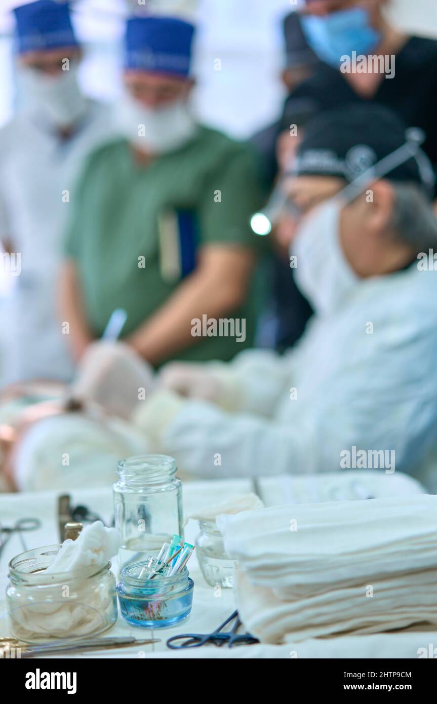 surgeon in the operating room performs an operation on a patient Stock ...
