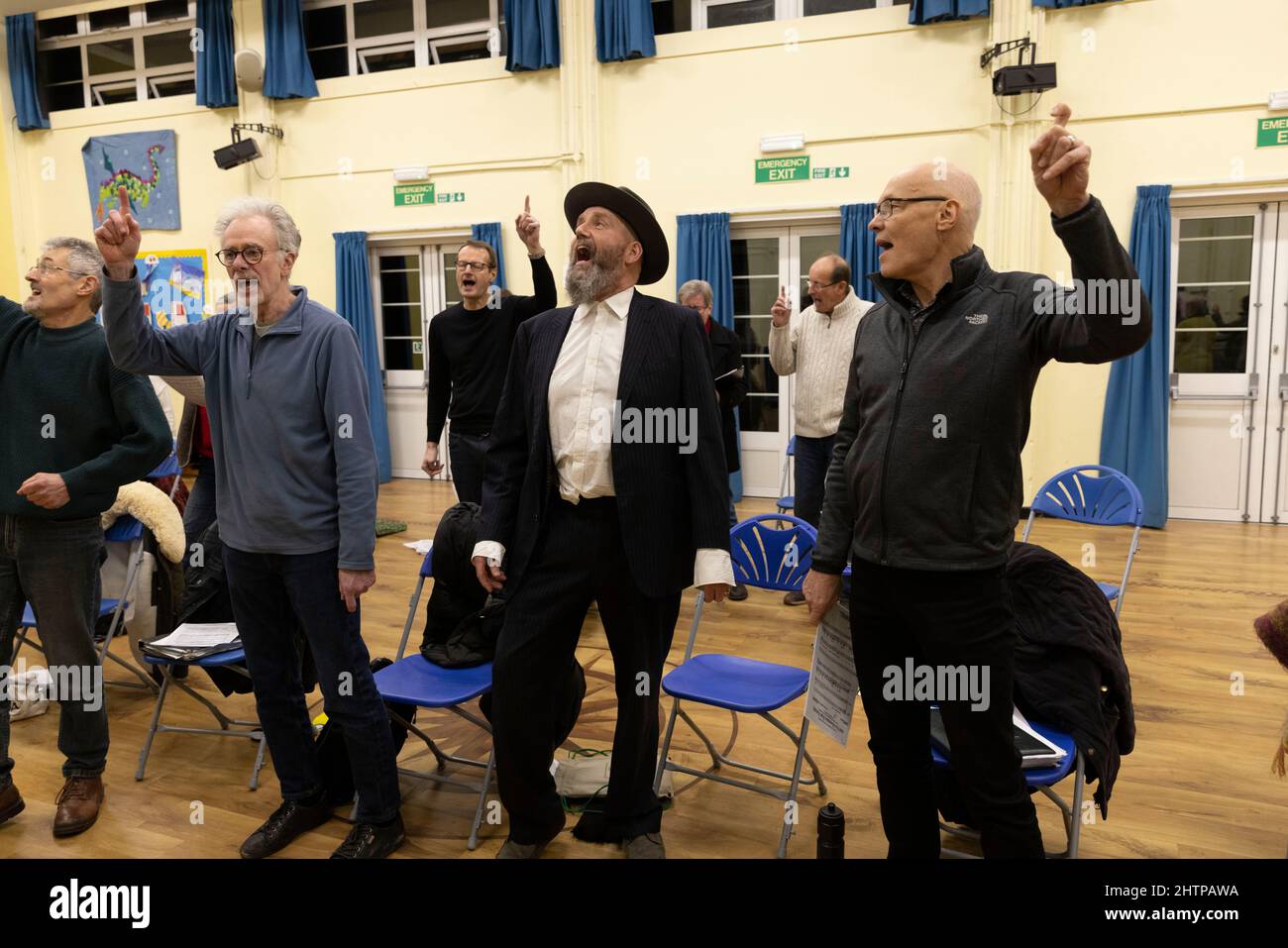 Brighton City Singers with choirmaster MJ Paranzino in Hove, East Sussex, UK Stock Photo