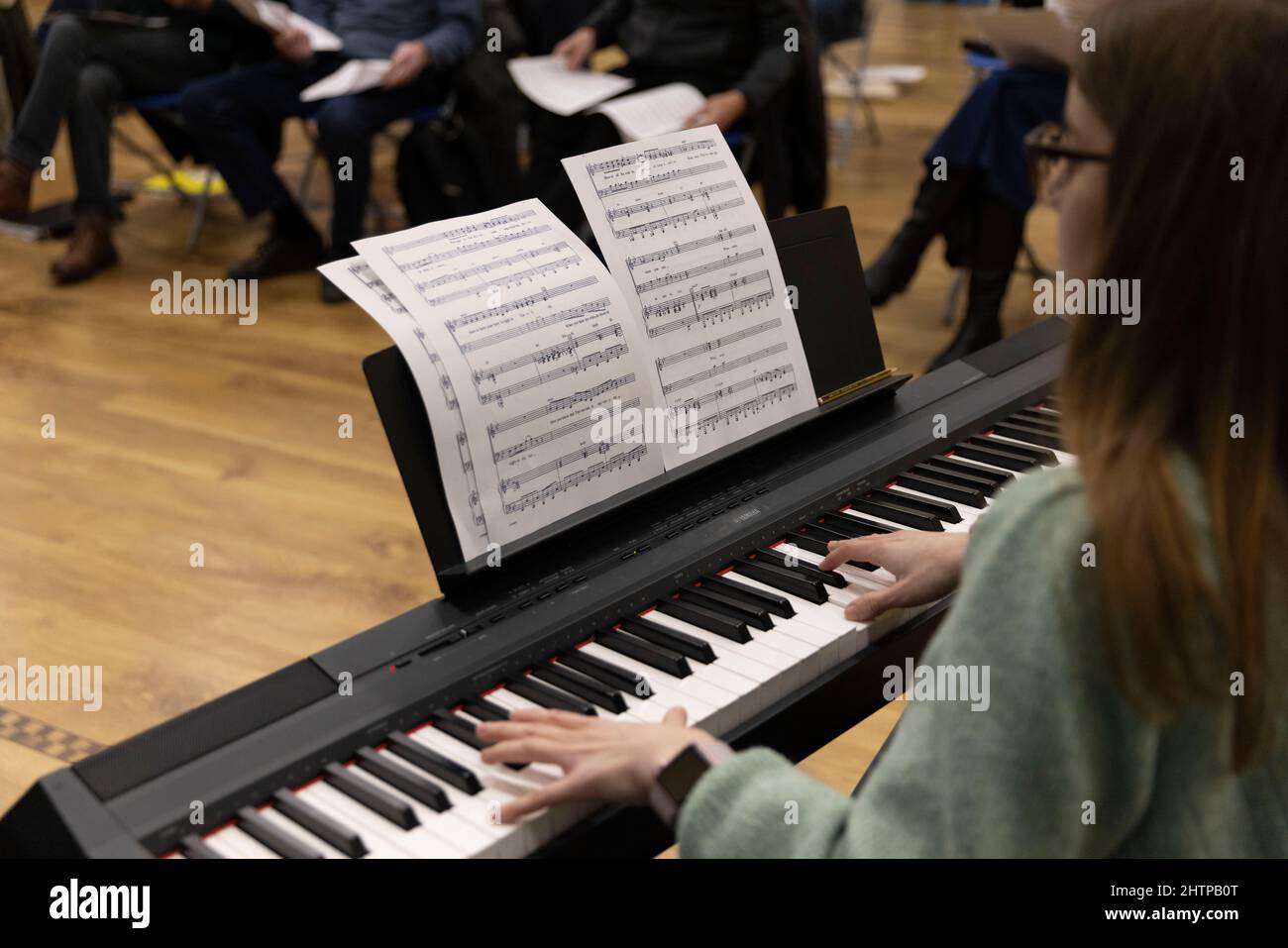 Brighton City Singers with choirmaster MJ Paranzino in Hove, East Sussex, UK Stock Photo