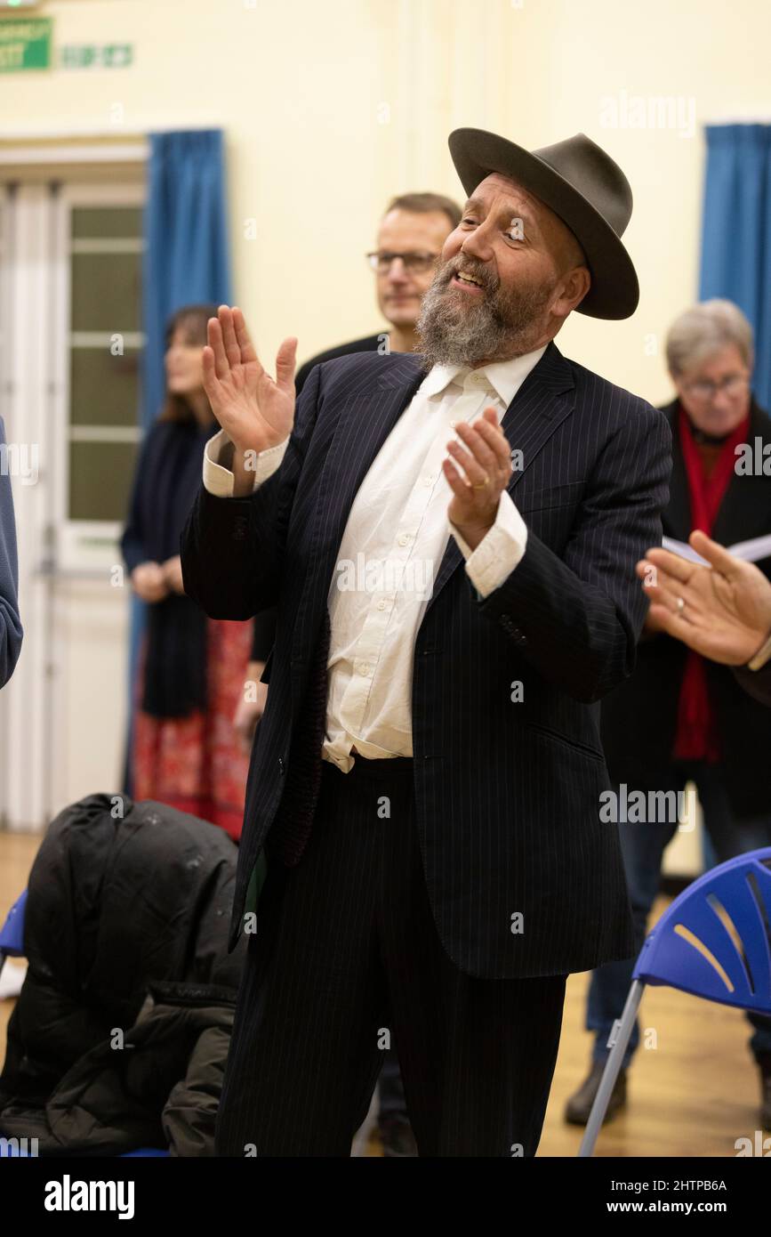 Brighton City Singers with choirmaster MJ Paranzino in Hove, East Sussex, UK Stock Photo