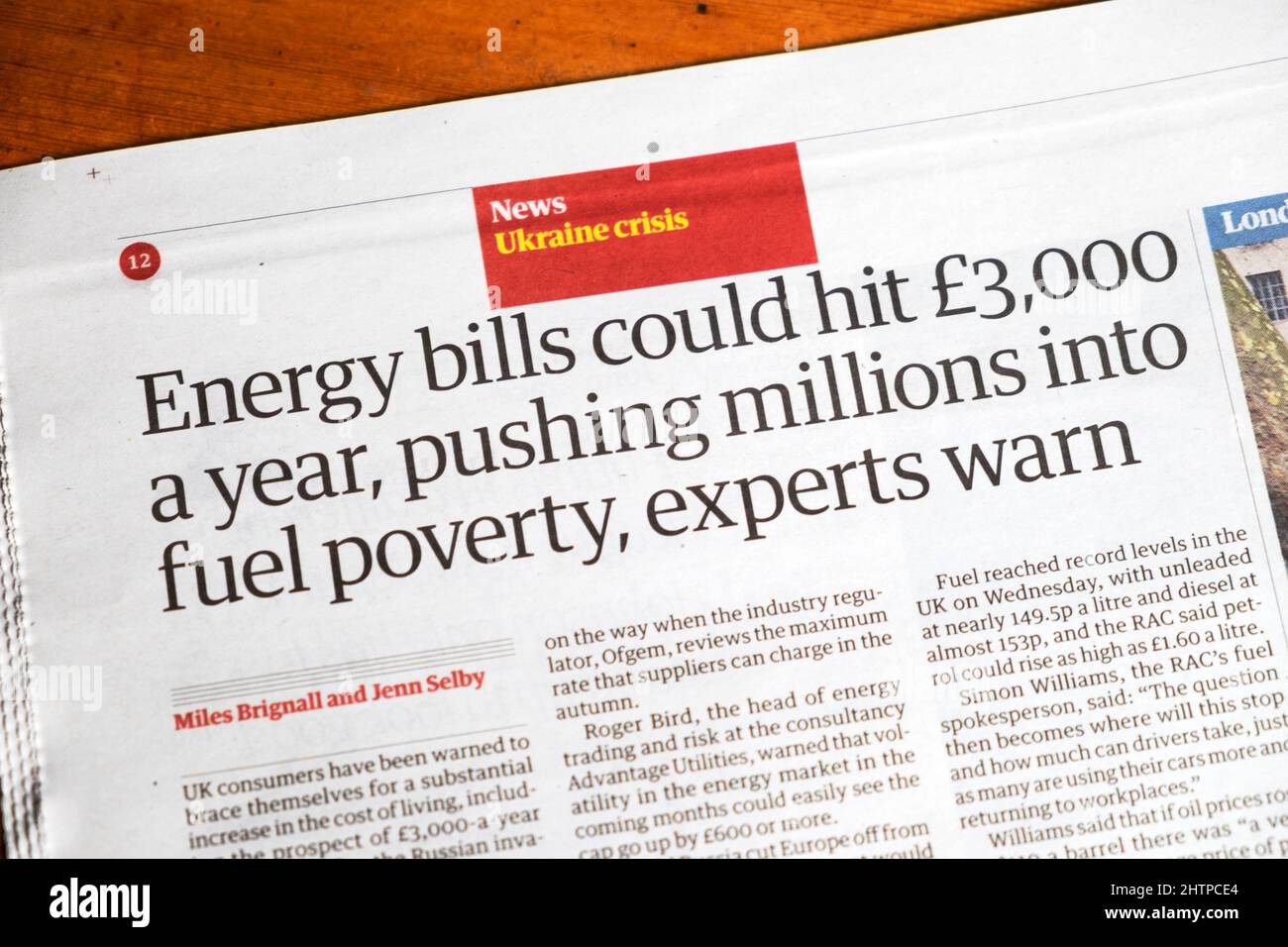 'Energy bills could hit £3,000 a year pushing millions into fuel poverty, experts warn' Guardian newspaper clipping Ukraine crisis 25 February 2022 UK Stock Photo
