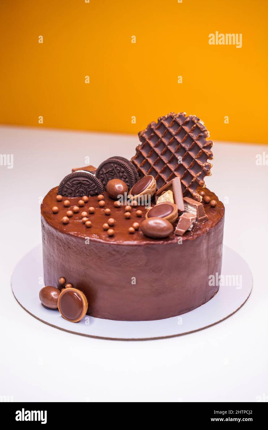 Homemade chocolate cake decorated with sweets Stock Photo - Alamy