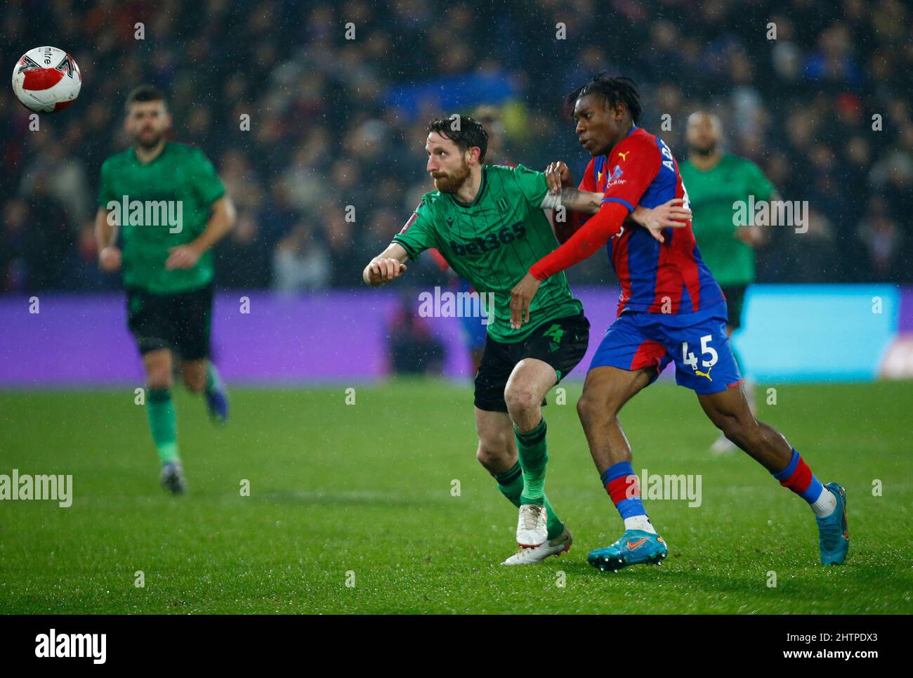 LONDON, United Kingdom, MARCH 01: L-R Joe Allen of Stoke City holds of ...